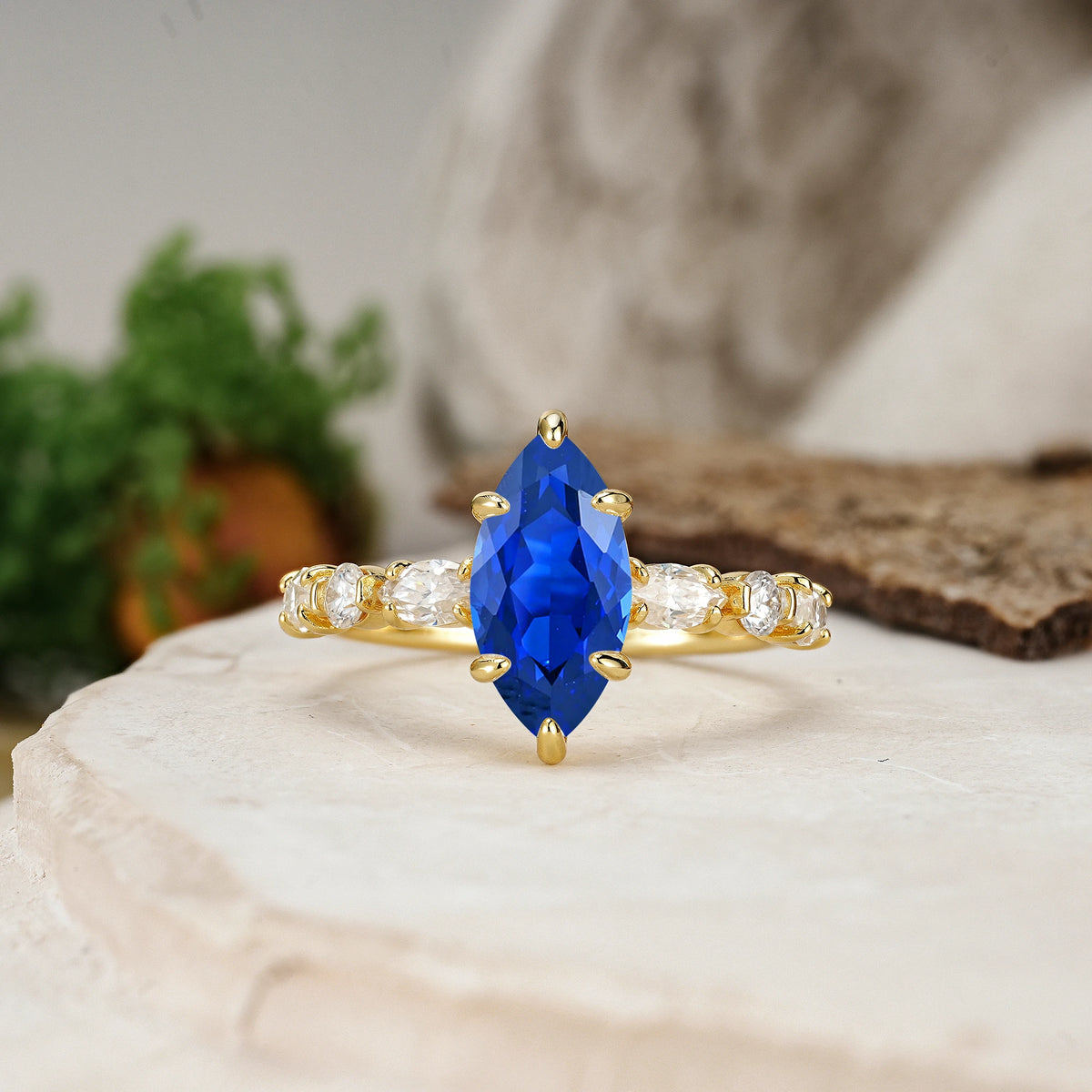 Marquise Cut Sapphire Three Stone Engagement Ring with Pear Side Stones