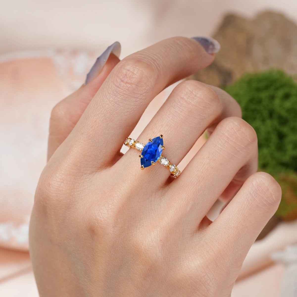 Marquise Cut Sapphire Three Stone Engagement Ring with Pear Side Stones