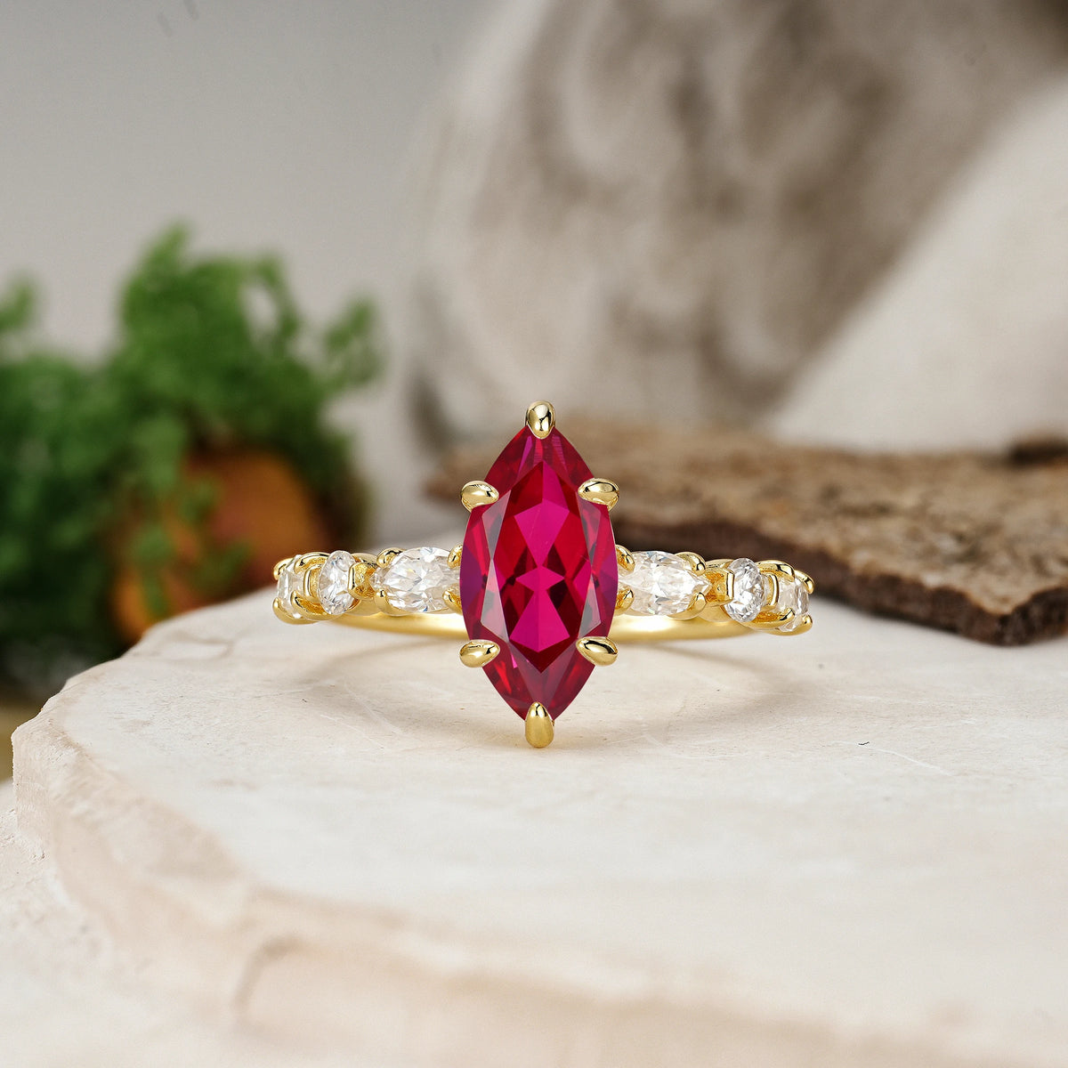 Marquise Cut Ruby Three Stone Engagement Ring with Pear Side Stones